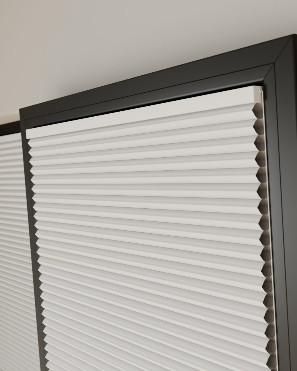 This image shows white clic honey comb blinds fitted onto a black window frame