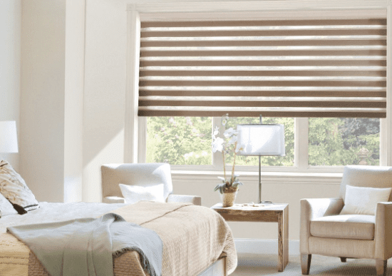 A picture of luxury brown day and night blinds in a bedroom.